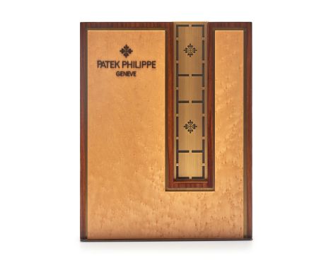 PATEK PHILIPPE SHOWROOM DISPLAY. - In wood with Patek Philippe logo on relief.  Size: