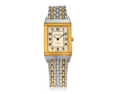 JAEGER-LECOULTRE REVERSO REF. 141.001 IN STEEL AND GOLD, BOX AND GUARANTEE, SOLD IN 1985 - Case: signed, n. 1601271, steel br