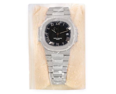PATEK PHILIPPE NAUTILUS REF. 3710 "COMET", BOX AND GUARANTEE, SEALED, SOLD IN 2005 - Case: signed, n. 4283033, stainless stee