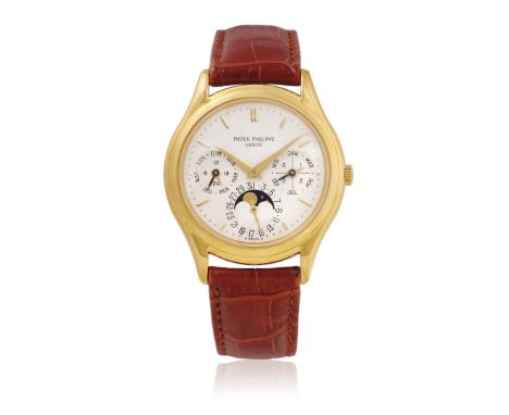 PATEK PHILIPPE PERPETUAL CALENDAR REF. 3940J IN GOLD, BOX AND GUARANTEE, SOLD IN 2003 - Case: signed, n. 4220792, 18K gold, s