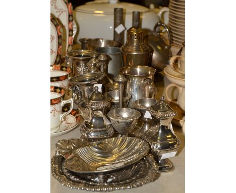 A late 19th century Walker and Hall silver plated sugar scuttle; an Art Deco sugar sifter, egg stand; cruets;   etc 