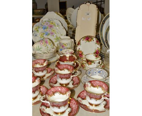 Teaware - a set of five Paragon teacups and saucers, printed with roses on a claret ground, picked out in gilt; a Rosina Chin