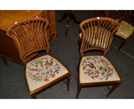A pair of Edwardian mahogany and satinwood strung side chairs, tapestry seats, tapered legs ,c. 1910