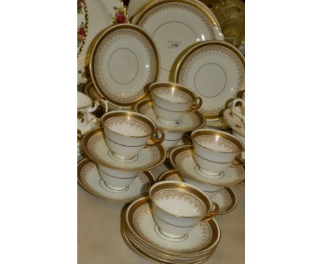 A Staffordshire tea service , decorated with a gold band and Greek Key pattern 