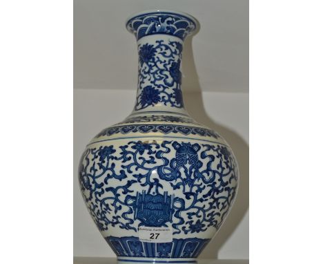 A large Chinese blue and white vase, decorated with scrolling lotus and foliage, long neck everted rim, 33cm high, seal mark