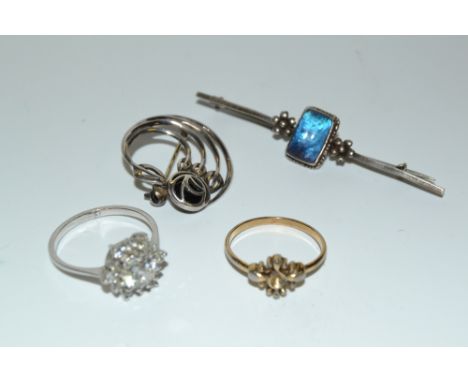 A sterling silver bar brooch; another, in the Art Nouveau taste, marked MH; two dress rings (4)