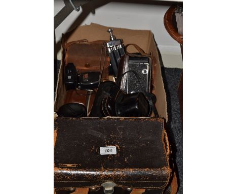 Photographic Equipment - a Canon FX,Olympus XA2, Rowi telescopic tripod, a Rolleicord camera, etc