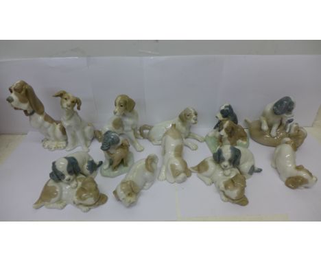 Twelve Nao dog and puppy figures