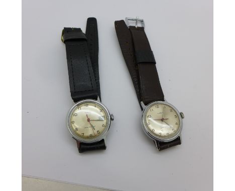 Two Timex wristwatches
