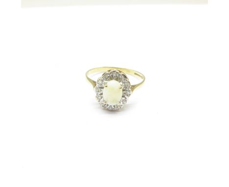 A 9ct gold, opal and diamond ring, 1.8g, O