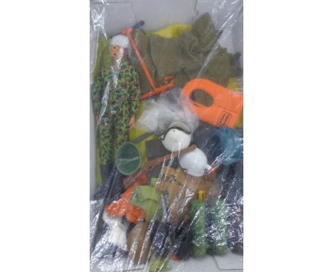 An Action Man Red Devil parachutist with clothing and accessories and a Royal Marines action figure with clothing and accesso