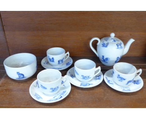 A 19th Century Copeland Spode children's tea set, four cups and saucers, teapot and sugar bowl, decorated with animals