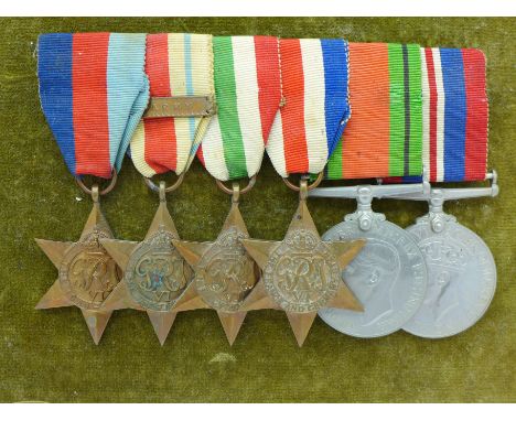 A set of WWII British medals, including Africa Star with 8th Army clasp