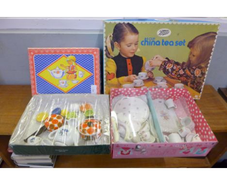 Four children's ceramic tea sets