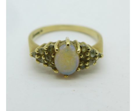 A 9ct gold, opal and white stone ring, 2.4g, P