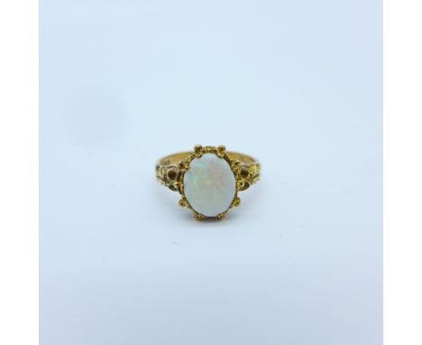 A 9ct gold and opal ring, 2.6g, K