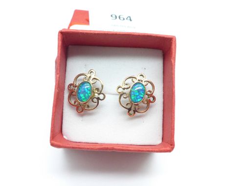 A pair of 9ct gold and synthetic opal ear studs, 2.6g