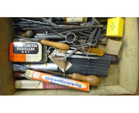An Air Ministry Aeronautical Inspection Directorate (A.I.D.) case with a collection of tools, the case marked A.I.D. 9.L.8, w