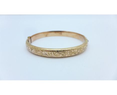 A 9ct rose gold bangle, 8.5g