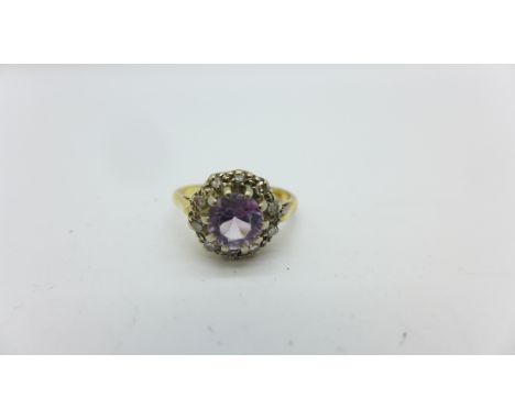 An 18ct gold, amethyst and diamond ring, 3.3g, K