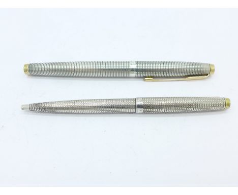 A sterling silver Parker fountain pen with a 14ct gold nib and matching silver Parker ballpoint pen