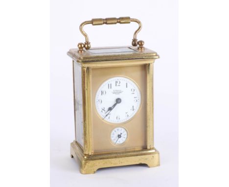 A French alarm carriage clock, brass case, the dial marked E. Bedin, Champs Elysees, France, with key, height 15cm, handle up