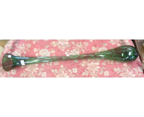 A vintage hand blown green glass yard of ale
