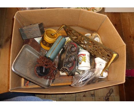 A box of various items including brass jug, costume jewellery, Portmeirion dish, oil lamp, etc.