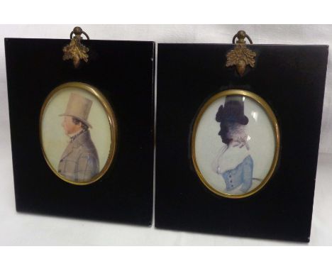 Two reproduction portrait miniature prints in ebonised papier-mâché frames - sold with three silhouette portraits of military