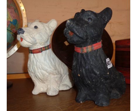 A pair of vintage composition advertising dog figures for Black &amp; White Whisky