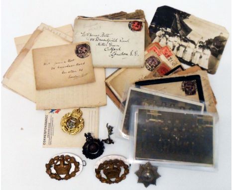 Military letter from a First World War soldier, six cap badges and postcards