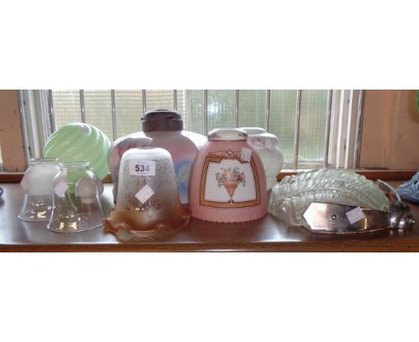 Eight assorted glass lamp shades including an Art Deco shell uplighter