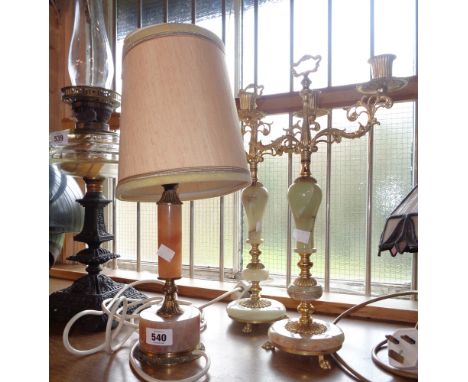 A pair of brass and onyx candelabra - sold with an onyx table lamp