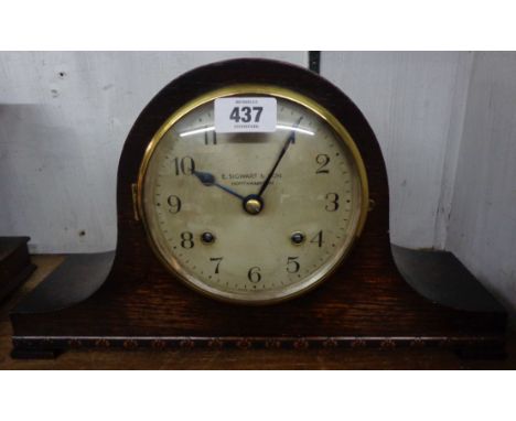 An oak cased Napoleon hat mantel clock with eight day gong striking movement