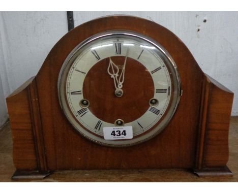 A mid 20th Century walnut cased mantel clock with Smiths Enfield eight day chiming movement