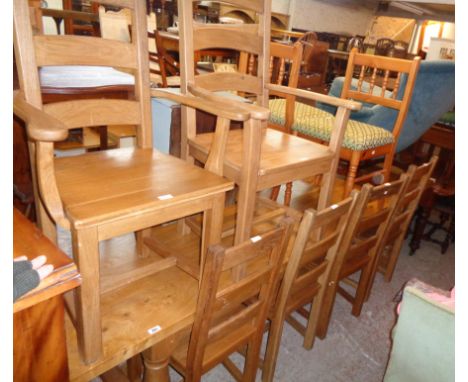 A 9' 2" polished golden oak refectory table with thick solid top, set on flanking turned supports and uniting stretcher - sol