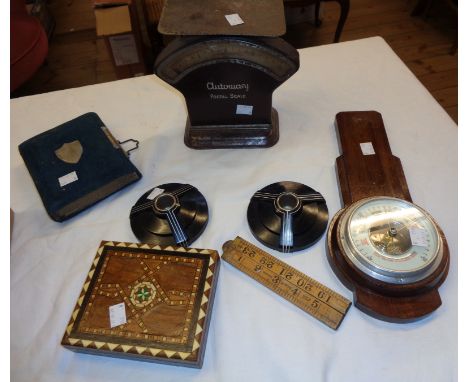 A Victorian photograph album, inlaid box, barometer, pair of Art Deco bakelite candlesticks, postal scales, etc.