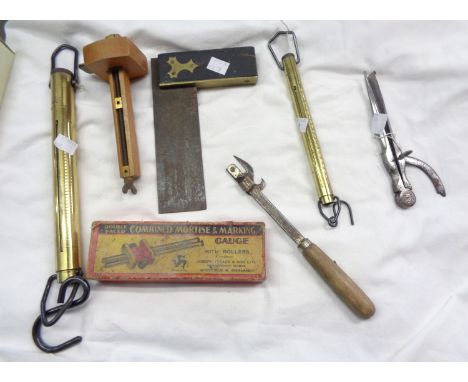 A box of tools including a boxed combined mortise &amp; marking gauge, pocket balance, set square, etc.