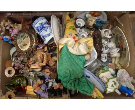 Two boxes containing various ceramic figures and ornaments
