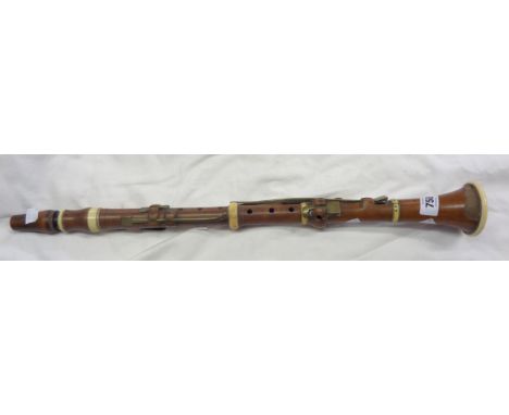 An early 19th Century boxwood and ivory bound clarinet with brass keys by Hermann Wrede of London - a/f