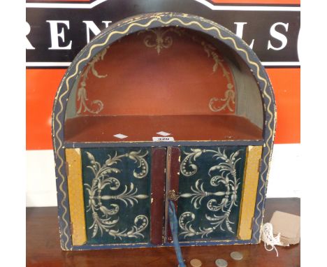 A 15 3/4" vintage wall mounted decorative dome-top cabinet with shelf and pair of doors under