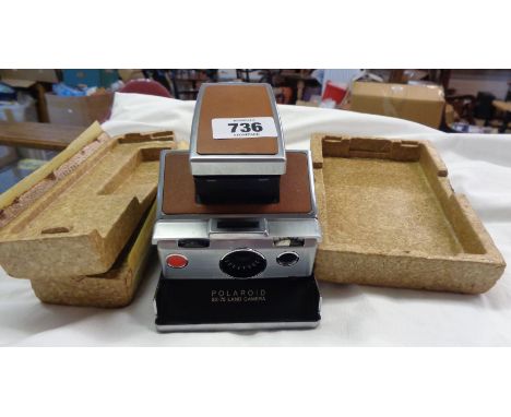A Polaroid Land Camera SX-70 in original packaging