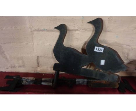 A goose pattern weather vane and a Dartmouth pottery planter
