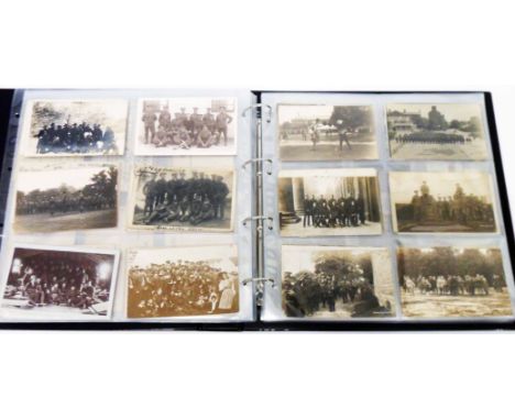 A box sleeved album containing mainly First World War and Boer War postcards including Tommy's life series