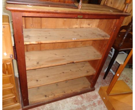 A 3' 6" Victorian pitch pine four shelf bookcase with moulded top and plinth base - doors removed