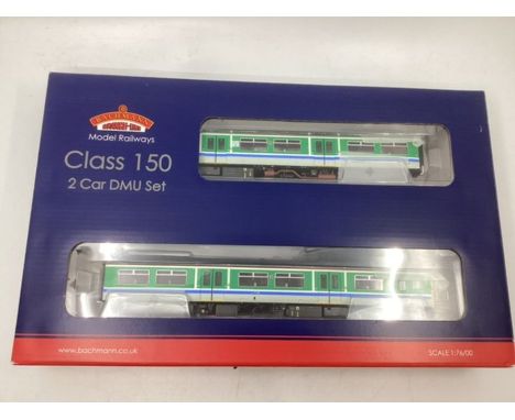 Vintage Model Railway interest; 150202 Class 150 &nbsp;leaf green 2 car railway set DMU set boxed as sold and appears unused.