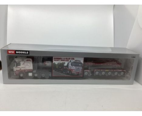 Fine Model Truck; WSI extended long wheel base Donnell and Ellis Ltd red 1;50 scale in long box-new and unused .(1)