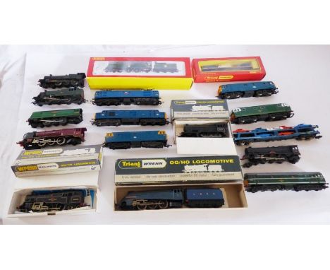 Vintage model railway. Selection of incomplete and compete 0 gauge carriages and trucks with accessories. Large box of locos 