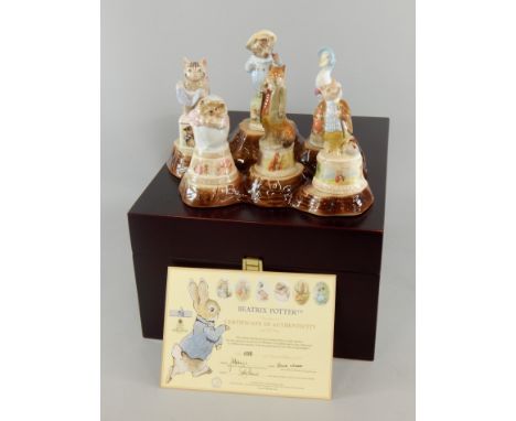 Royal Worcester Beatrix Potter collection porcelain candle snuffers and stands, in fitted case with certificate, limited edit
