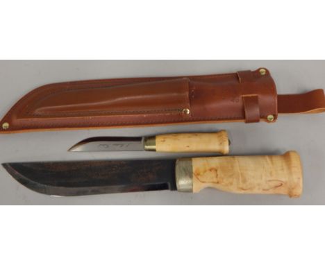 A hunting knife, by J. Marttiini, Finland, number 295, with leather scabbard